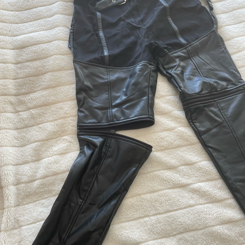 Leather pants with zipper details